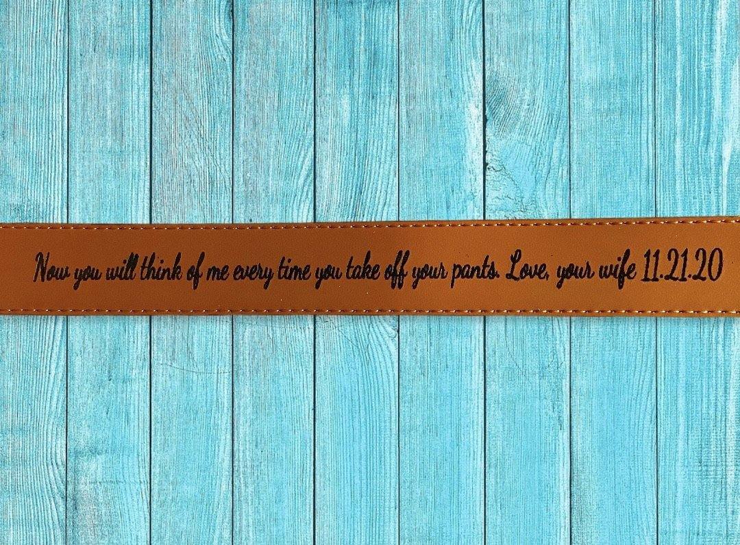Custom engraved leather belt with a secret message on the inside.
