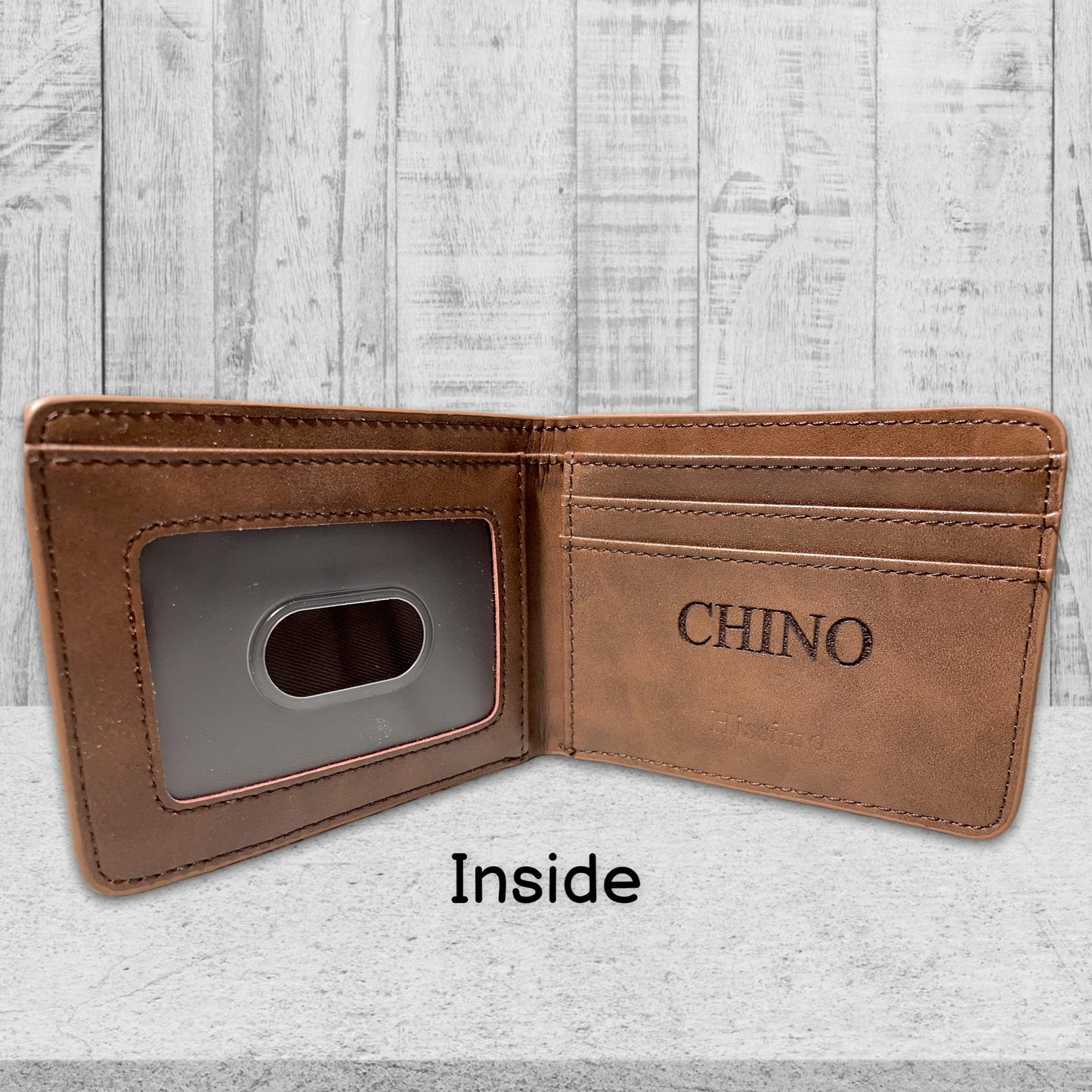 Wallet interior with text engraving.