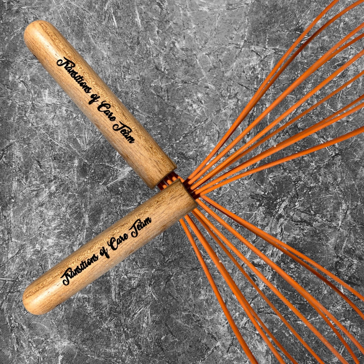 Personalized whisk with engraved wooden handle and rubber-coated whisk head