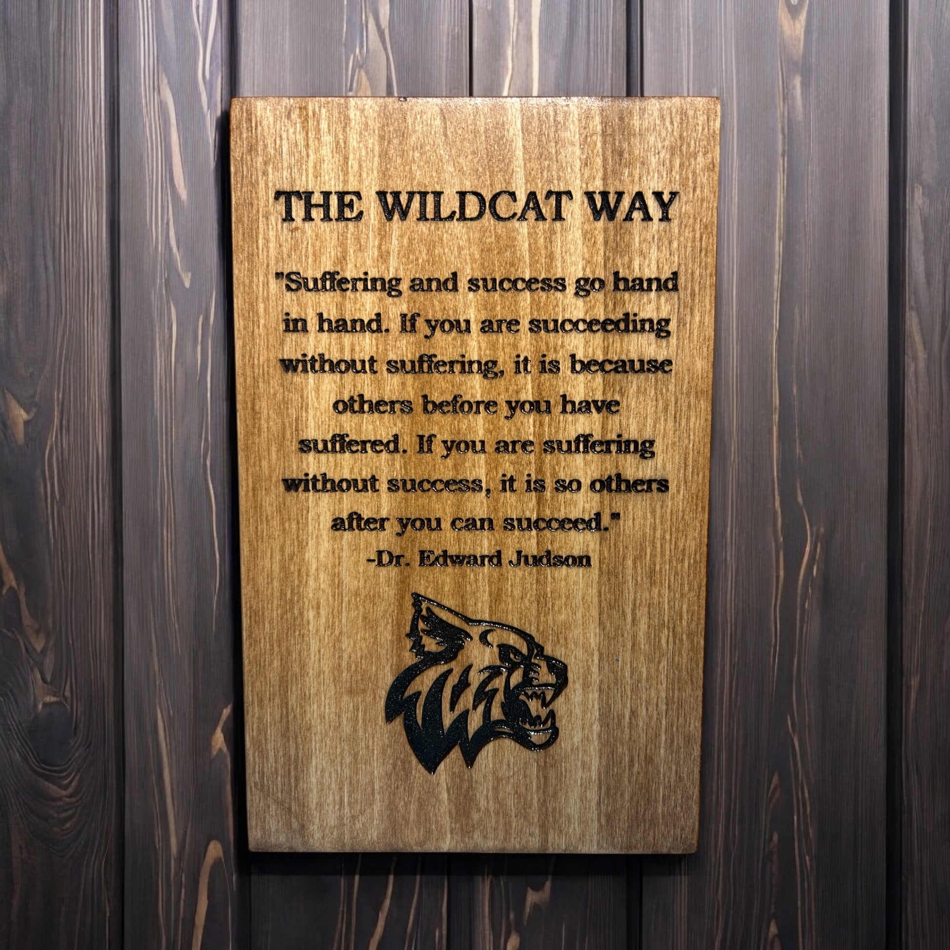 athletic program culture sign made from wood