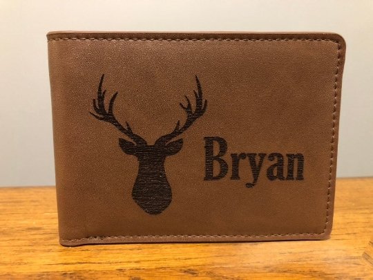 Personalized deer hunting laser-engraved leather wallet.