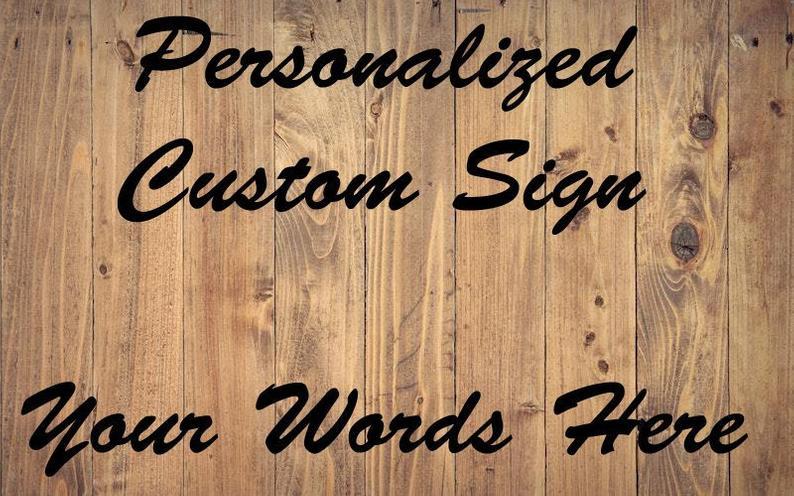 Personalized wood sign with laser engraving detail